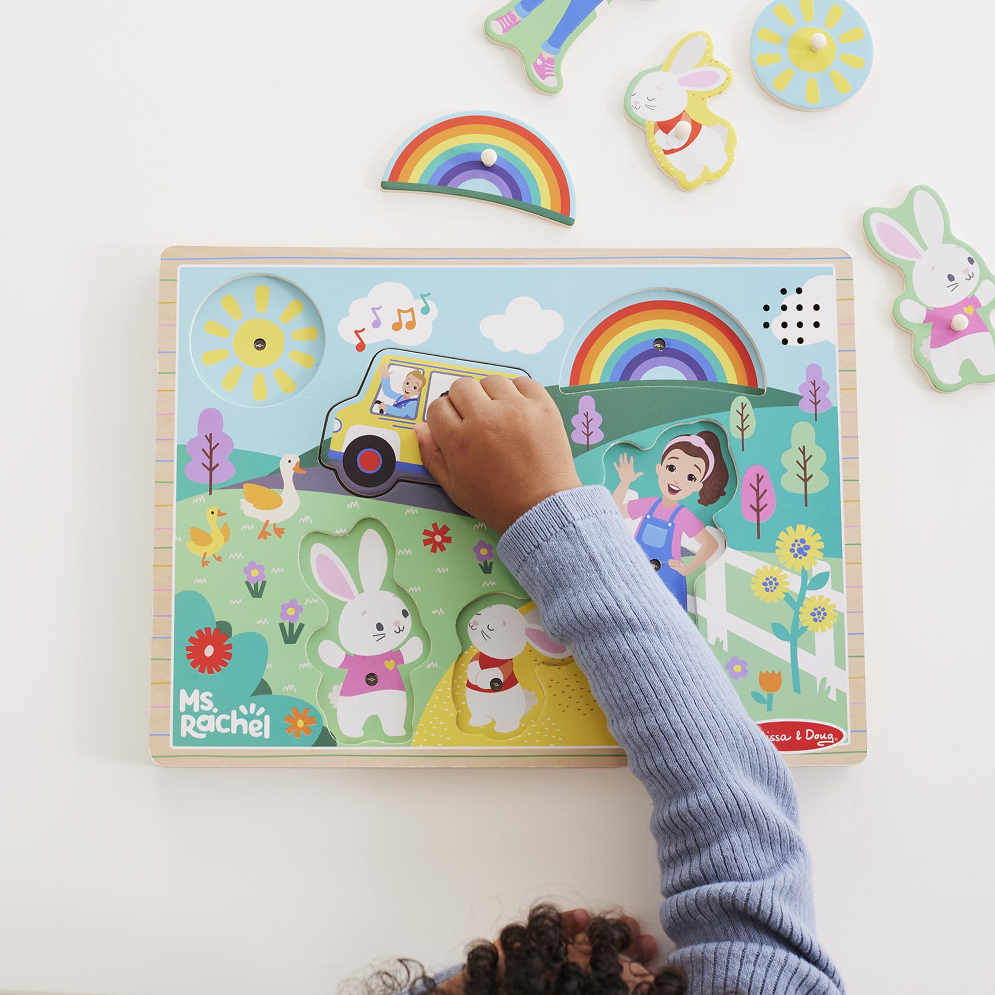 Melissa & Doug Ms. Rachel Wooden Song Peg Puzzle - Light-Activated Sound | Ages 2+
