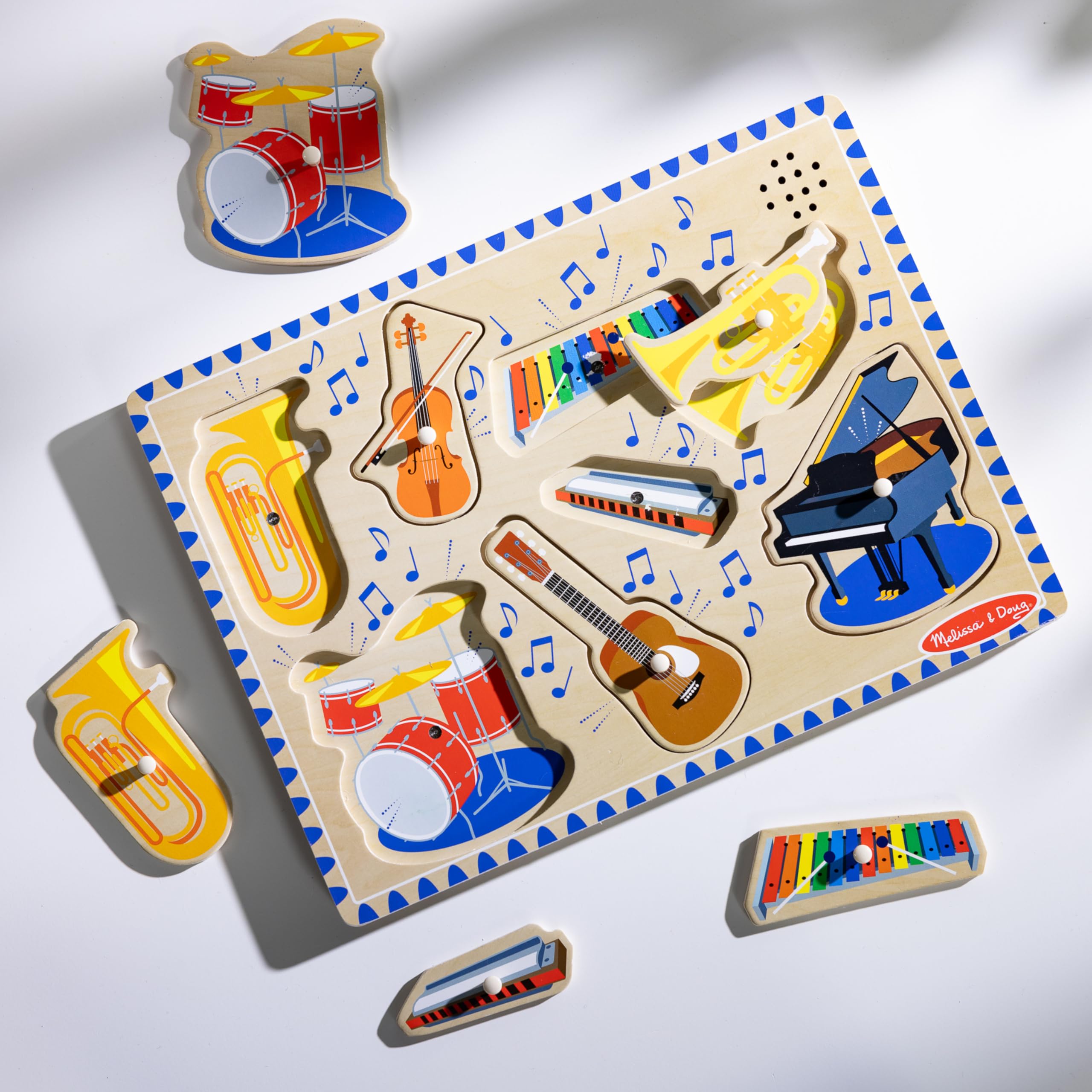 Melissa & Doug Musical Instruments Sound Puzzle - Wooden Peg Puzzle for Ages 2-5 | 8 Pieces 9